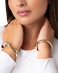 Bracciale a base esagonale rigido a manetta in metallo colore oro lucido - Mya Accessories