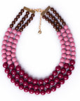 Collana girocollo multilinee con sfere in acrilico tono viola
