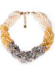 Collana girocollo a treccia con sfere in acrilico sui toni chiari - Mya Accessories