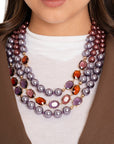 Collana girocollo multilinee con perle in acrilico viola ed ambra - Mya Accessories