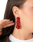 Orecchini a fiore con pietre in vetro rosse - Mya Accessories