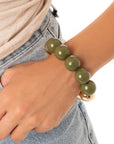 Bracciale elastico con sfere verdi ed oro - Mya Accessories