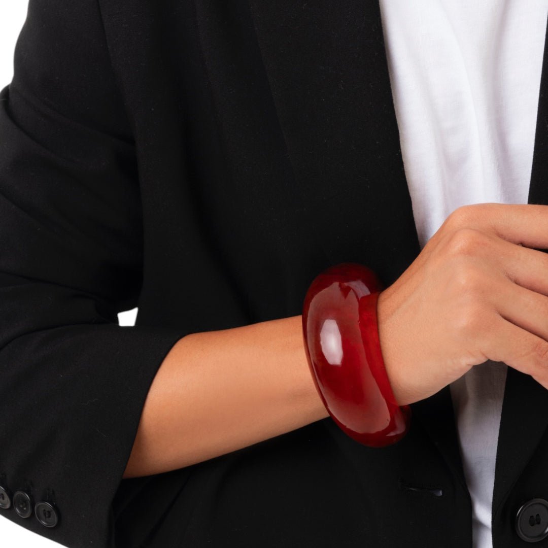 Bracciale semi luna rigido in resina colore ambra - Mya Accessories