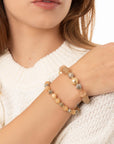 Bracciale elastico a due linee con sfere in resina, acrilico e vetro tono beige - Mya Accessories