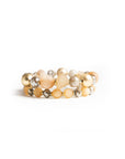 Bracciale elastico a due linee con sfere in resina, acrilico e vetro tono beige - Mya Accessories