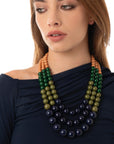 Collana a tre fili con sfere in acrilico blu, verde e senape - Mya Accessories