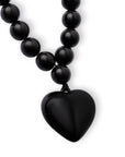 Collana girocollo con sfere in acrilico e pendente a cuore nero - Mya Accessories