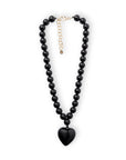 Collana girocollo con sfere in acrilico e pendente a cuore nero - Mya Accessories