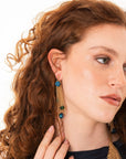 Orecchini pendenti con fili di catene e pietre in vetro blu - Mya Accessories