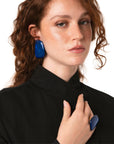 Orecchini a clip con pietra geometrica in acrilico blu - Mya Accessories