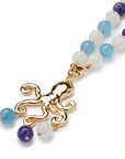 Collana lunga con pietre dure multi blu, con pendente a forma di polipo in metallo - Mya Accessories