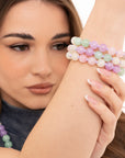 Bracciale elastico a tre fili con sfere in acrilico tono lilla - Mya Accessories