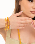 Bracciale elastico multilinee con pietre in vetro tono giallo - Mya Accessories