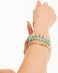 Bracciale elastico multilinee con pietre in vetro verde acqua - Mya Accessories