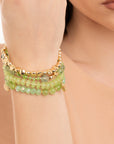 Bracciale elastico multilinee con pietre in vetro verde - Mya Accessories