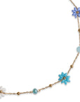 Collana girocollo in acciaio con fiorellini in vetro tono azzurro - Mya Accessories