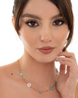 Collana girocollo in acciaio con fiorellini in vetro tono azzurro - Mya Accessories