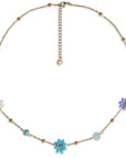 Collana girocollo in acciaio con fiorellini in vetro tono azzurro - Mya Accessories