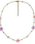 Collana girocollo in acciaio con fiorellini in vetro tono rosa - Mya Accessories