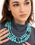 Collana multi linee con pietre sintetiche turchesi ed inserti in vetro tono blu - Mya Accessories