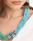 Collana con micro cristalli intrecciati tono azzurro e verde, inserto in vetro - Mya Accessories