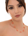 Collana girocollo a catena con fiori in acrilico perlati arancio - Mya Accessories