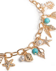 Collana girocollo a catena con sfere turchese e charms marini - Mya Accessories