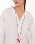 Collana lunga a filo di cotone con pendente a stella marina con micro cristalli rossi - Mya Accessories