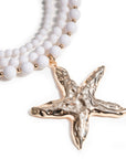 Collana girocollo a tre linee con pietre in acrilico bianche e pendente in metallo a stella marina - Mya Accessories