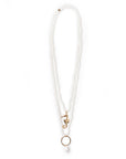 Collana sali e scendi con micro cristalli bianchi e pendente a cavalluccio marino in metallo