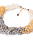 Collana girocollo a treccia con sfere in acrilico sui toni chiari - Mya Accessories