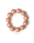 Bracciale elastico con sfere lucide in acrilico rosa - Mya Accessories