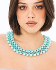 Collana girocollo con sfere in acrilico intrecciate turchesi - Mya Accessories