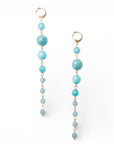 Orecchini pendenti lunghi con pietre dure a sfera turchesi - Mya Accessories