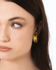 Orecchini a clip ovali smaltati con fiori gialli e fucsia - Mya Accessories