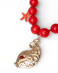 Collana lunga con sfere rosse in acrilico e pendente pesciolino in metallo - Mya Accessories