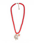 Collana lunga con sfere rosse in acrilico e pendente polipetto in metallo - Mya Accessories