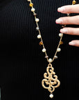 Collana lunga con microcristalli giallo e beige con pendente - Mya Accessories