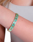 Bracciale in ottone a manetta smaltato celeste con zirconi multicolore - Mya Accessories