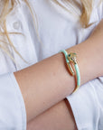 Bracciale in ottone a serpente smaltato verde acqua con zirconi - Mya Accessories