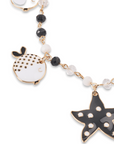 Bracciale con Charm Stella Marina e Pesce Palla in Metallo color Oro - Bianco e Nero - Mya Accessories