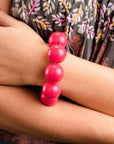 Bracciale con sfere XXL elastico in acrilico fucsia - Mya Accessories