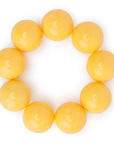Bracciale con sfere XXL elastico in acrilico giallo - Mya Accessories