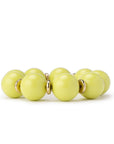 Bracciale elastico con sfere in acrilico verde lime, con rondelle in metallo - Mya Accessories