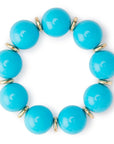 Bracciale elastico con sfere in acrilico azzurro, con rondelle in metallo - Mya Accessories