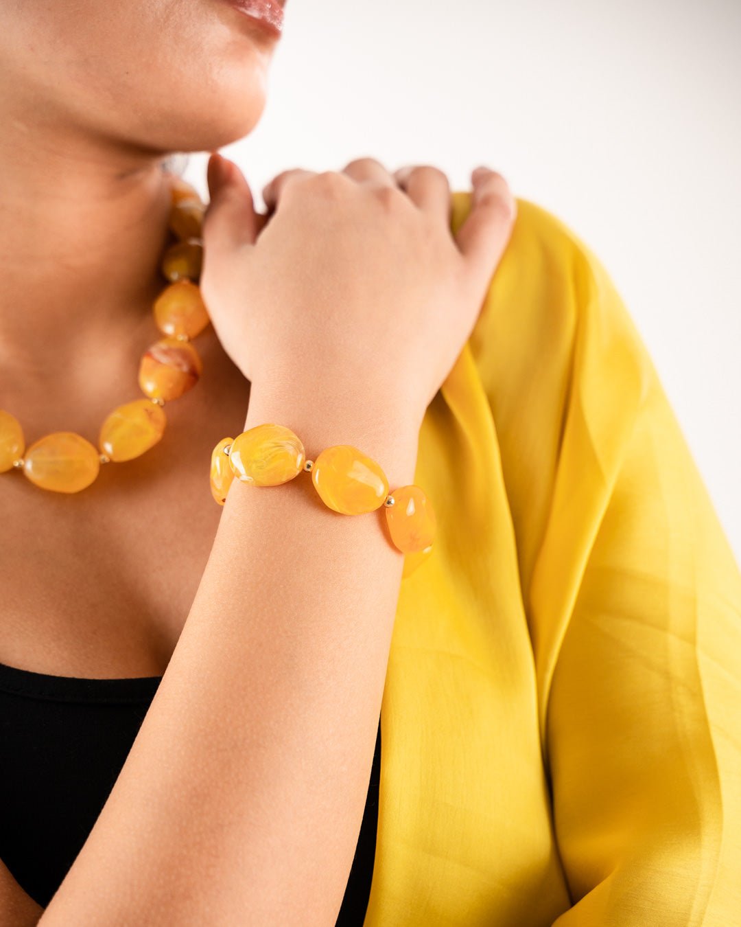 Bracciale elastico pietre acrilico arancio - Mya Accessories