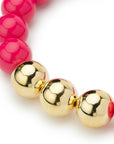 Collana girocollo in acrilico con sfere fucsia di cui tre placcate in oro - Mya Accessories