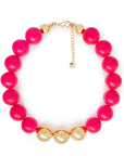Collana girocollo in acrilico con sfere fucsia di cui tre placcate in oro - Mya Accessories