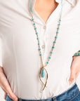 Collana lunga con microcristalli turchesi con pendente a pesce stilizzato con pietra turchese - Mya Accessories