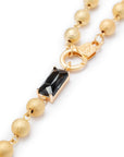Collana lunga con sfere in metallo con pietra in vetro nero - Mya Accessories